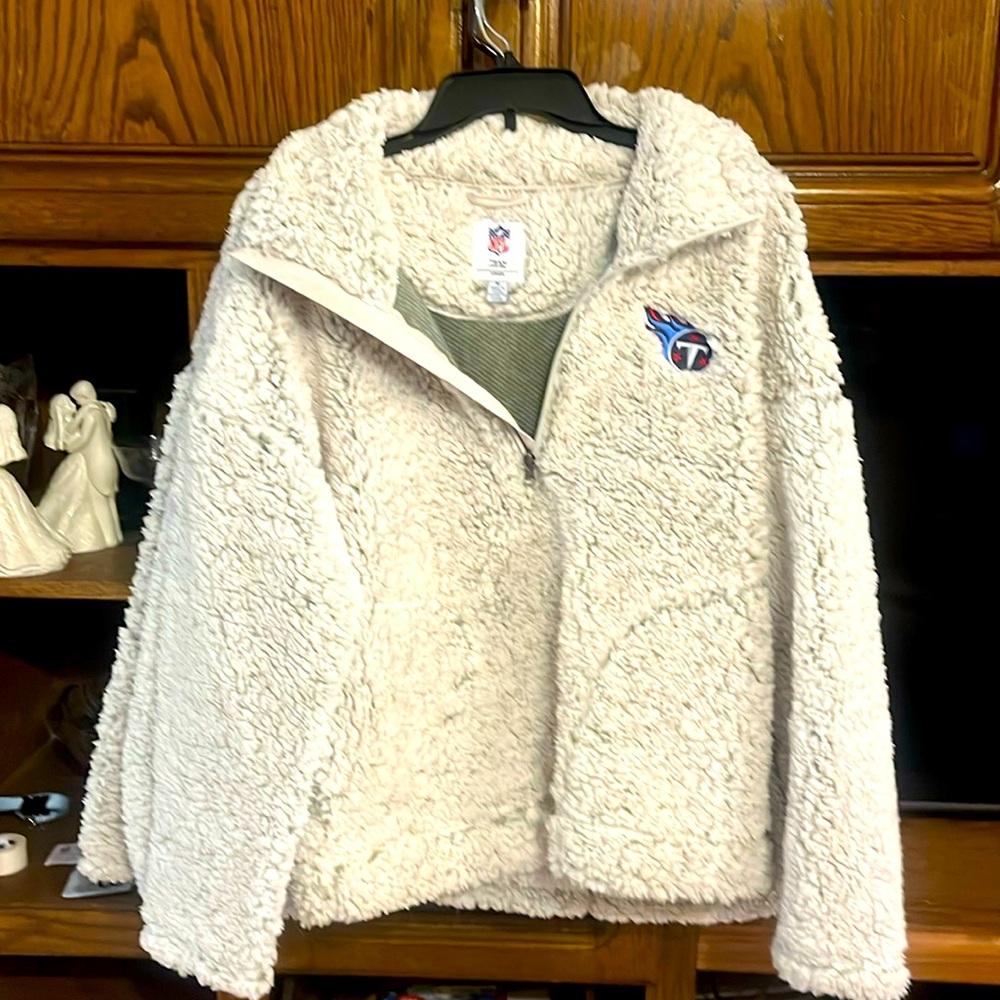 NFL Tennessee, Titans, Sherpa  jacket.
￼ Quarter zip pull over. Size M. NWT